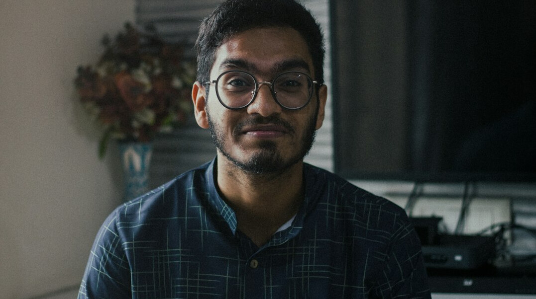 young professional programmer smiling