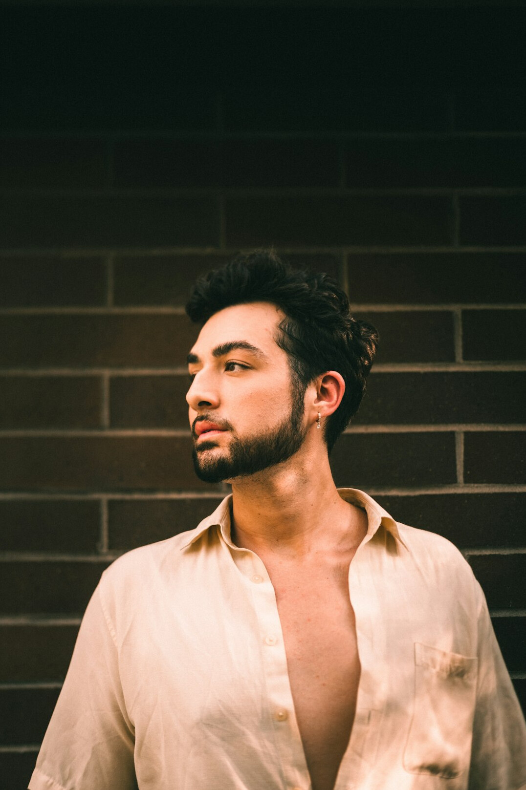 Portrait of a young man in a light shirt